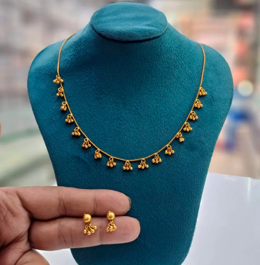 Minimal style ghunghroo neckline